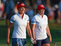 GAINESVILLE, VIRGINIA - SEPTEMBER 14: Lexi Thompson of the United States and Lauren Coughlin of the United States walk together to the 3rd g...