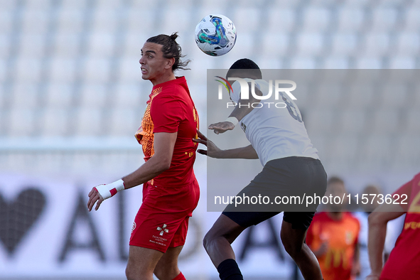 In Ta' Qali, Malta, on September 14, 2024, Alex Satariano (L) of Birkirkara competes for the ball with Rodrigo Khevin Fraga (R) of Hibernian...