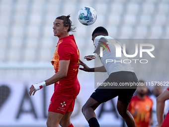 In Ta' Qali, Malta, on September 14, 2024, Alex Satariano (L) of Birkirkara competes for the ball with Rodrigo Khevin Fraga (R) of Hibernian...