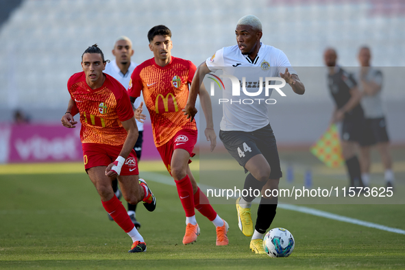 Nunes Silva Pedro Henrique (R) of Hibernians moves forward with the ball away from Alex Satariano (L) and Leandro Lautaro Lacunza (C) of Bir...