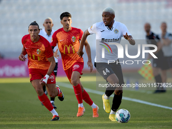 Nunes Silva Pedro Henrique (R) of Hibernians moves forward with the ball away from Alex Satariano (L) and Leandro Lautaro Lacunza (C) of Bir...