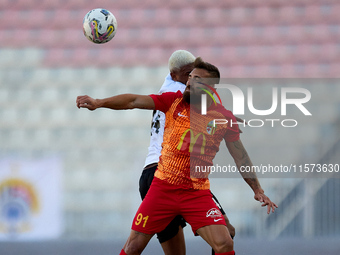 Nunes Silva Pedro Henrique (back) of Hibernians competes for the ball with Maxuel Samurai (front) of Birkirkara during the Malta 360 Sports...