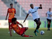 In Ta' Qali, Malta, on September 14, 2024, Alex Bruno de Souza Silva (right) of Hibernians is closely challenged by Augustin Sandona (left)...