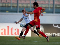 Jurgen Degabriele (L) of Hibernians is in action during the Malta 360 Sports Premier League soccer match between Hibernians and Birkirkara a...