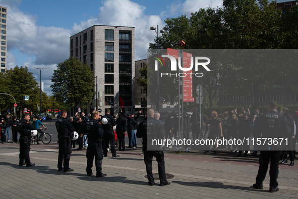 Dozens of people from the ANTIFA group protest against right-wing groups as dozens of counter-protesters from several right-wing groups orga...