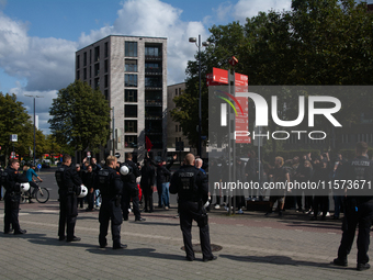 Dozens of people from the ANTIFA group protest against right-wing groups as dozens of counter-protesters from several right-wing groups orga...