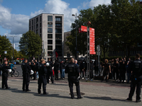 Dozens of people from the ANTIFA group protest against right-wing groups as dozens of counter-protesters from several right-wing groups orga...