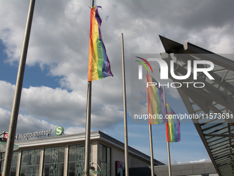 Rainbow flags are seen at the Dortmund Central Station as thousands of people take part in the annual traditional LGBTQ CSD demonstration in...