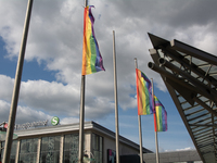 Rainbow flags are seen at the Dortmund Central Station as thousands of people take part in the annual traditional LGBTQ CSD demonstration in...