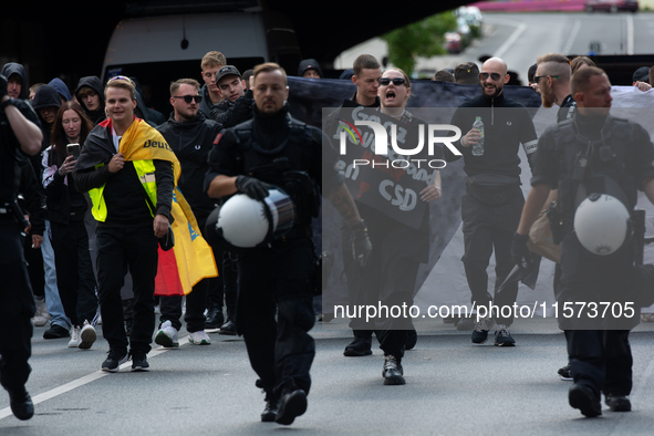 Dozens of counter-protesters from several right-wing groups organize a demonstration against the annual traditional LGBTQ CSD demonstration...