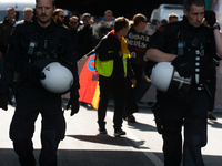 Dozens of counter-protesters from several right-wing groups organize a demonstration against the annual traditional LGBTQ CSD demonstration...