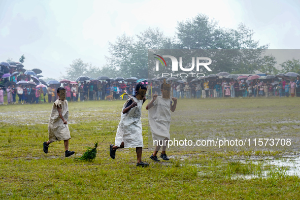 The Nepalese community wears traditional clothes and celebrates the Dhan Ropai festival in Panchthar, Nepal, on September 14, 2024. 