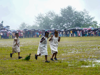 The Nepalese community wears traditional clothes and celebrates the Dhan Ropai festival in Panchthar, Nepal, on September 14, 2024. (