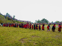 The Nepalese community wears traditional clothes and celebrates the Dhan Ropai festival in Panchthar, Nepal, on September 14, 2024. (