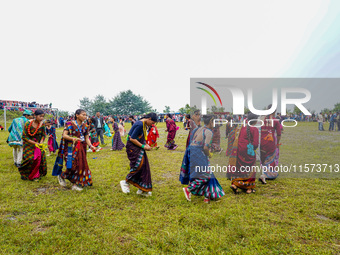 The Nepalese community wears traditional clothes and celebrates the Dhan Ropai festival in Panchthar, Nepal, on September 14, 2024. (