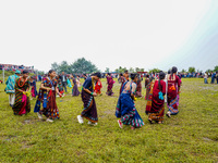 The Nepalese community wears traditional clothes and celebrates the Dhan Ropai festival in Panchthar, Nepal, on September 14, 2024. (