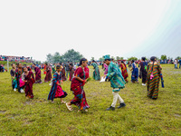 The Nepalese community wears traditional clothes and celebrates the Dhan Ropai festival in Panchthar, Nepal, on September 14, 2024. (