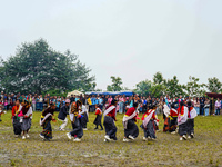 The Nepalese community wears traditional clothes and celebrates the Dhan Ropai festival in Panchthar, Nepal, on September 14, 2024. (