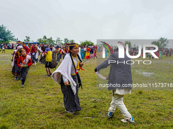 The Nepalese community wears traditional clothes and celebrates the Dhan Ropai festival in Panchthar, Nepal, on September 14, 2024. (