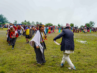 The Nepalese community wears traditional clothes and celebrates the Dhan Ropai festival in Panchthar, Nepal, on September 14, 2024. (