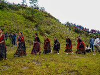 The Nepalese community wears traditional clothes and celebrates the Dhan Ropai festival in Panchthar, Nepal, on September 14, 2024. (