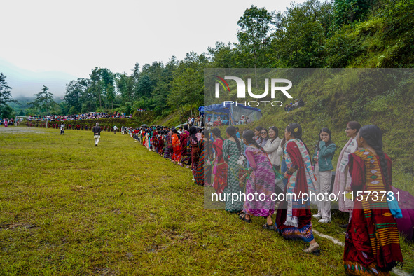 The Nepalese community wears traditional clothes and celebrates the Dhan Ropai festival in Panchthar, Nepal, on September 14, 2024. 