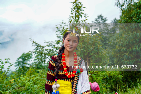 The Nepalese community wears traditional clothes and celebrates the Dhan Ropai festival in Panchthar, Nepal, on September 14, 2024. 