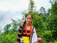 The Nepalese community wears traditional clothes and celebrates the Dhan Ropai festival in Panchthar, Nepal, on September 14, 2024. (