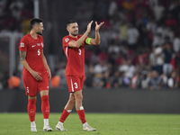 Okay Yokuslu and Merih Demiral of Turkey  during the UEFA Nations League 2024/25 League B Group B4 match between Turkiye and Iceland at Gurs...