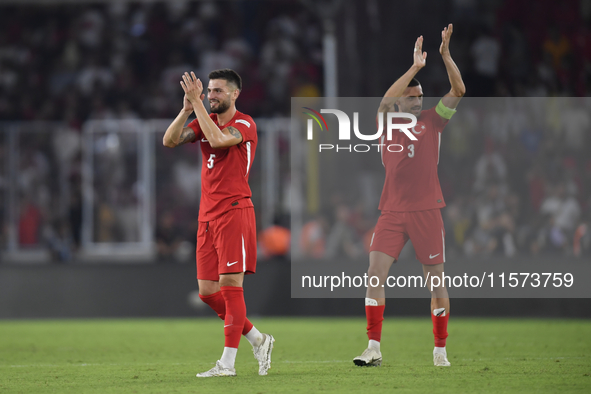 Okay Yokuslu and Merih Demiral of Turkey  during the UEFA Nations League 2024/25 League B Group B4 match between Turkiye and Iceland at Gurs...