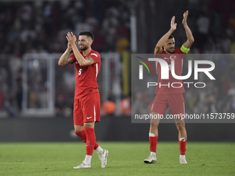 Okay Yokuslu and Merih Demiral of Turkey  during the UEFA Nations League 2024/25 League B Group B4 match between Turkiye and Iceland at Gurs...