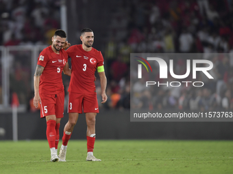 Okay Yokuslu and Merih Demiral of Turkey  during the UEFA Nations League 2024/25 League B Group B4 match between Turkiye and Iceland at Gurs...