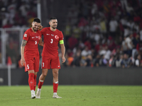 Okay Yokuslu and Merih Demiral of Turkey  during the UEFA Nations League 2024/25 League B Group B4 match between Turkiye and Iceland at Gurs...