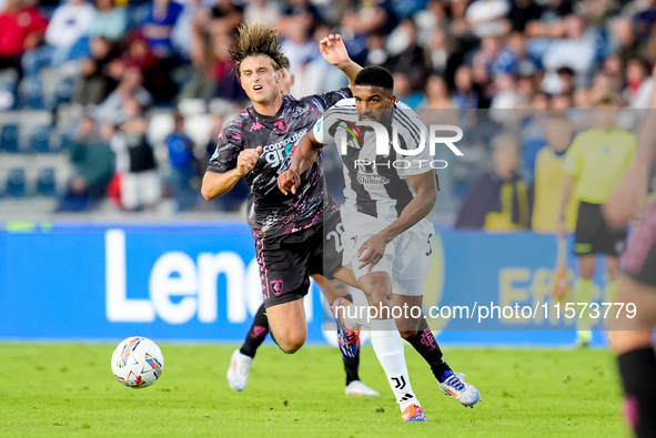 Lorenzo Colombo of Empoli FC and Bremer of Juventus FC compete for the ball during the Serie A Enilive match between Empoli FC and Juventus...