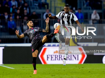 Pierre Kalulu of Juventus FC and Giuseppe Pezzella of Empoli FC compete for the ball during the Serie A Enilive match between Empoli FC and...