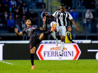 Pierre Kalulu of Juventus FC and Giuseppe Pezzella of Empoli FC compete for the ball during the Serie A Enilive match between Empoli FC and...