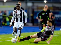 Timothy Weah of Juventus FC and Ardian Ismajli of Empoli FC compete for the ball during the Serie A Enilive match between Empoli FC and Juve...