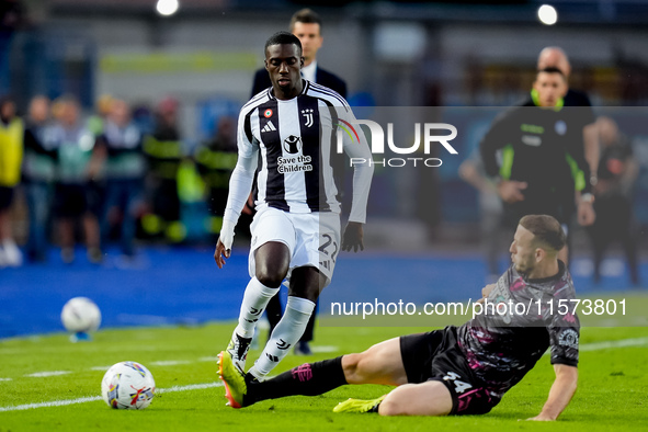 Timothy Weah of Juventus FC and Ardian Ismajli of Empoli FC compete for the ball during the Serie A Enilive match between Empoli FC and Juve...