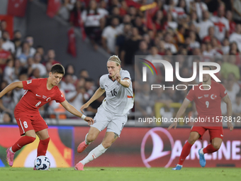 Arda Guler of Turkey and Stefan Teitur Thordarson of Iceland   during the UEFA Nations League 2024/25 League B Group B4 match between Turkiy...