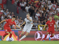 Arda Guler of Turkey and Stefan Teitur Thordarson of Iceland   during the UEFA Nations League 2024/25 League B Group B4 match between Turkiy...