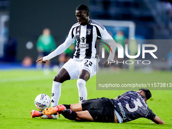 Timothy Weah of Juventus FC and Giuseppe Pezzella of Empoli FC compete for the ball during the Serie A Enilive match between Empoli FC and J...