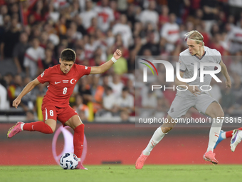 Arda Guler of Turkey and Stefan Teitur Thordarson of Iceland   during the UEFA Nations League 2024/25 League B Group B4 match between Turkiy...