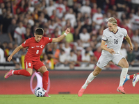 Arda Guler of Turkey and Stefan Teitur Thordarson of Iceland   during the UEFA Nations League 2024/25 League B Group B4 match between Turkiy...