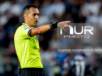 Referee Marco Di Bello gestures during the Serie A Enilive match between Empoli FC and Juventus FC at Stadio Carlo Castellani on September 1...