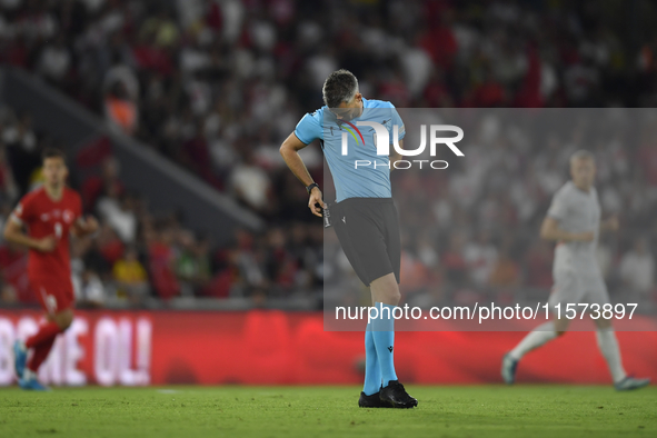 Referee Enea Jorgji in action  during the UEFA Nations League 2024/25 League B Group B4 match between Turkiye and Iceland at Gursel Aksel St...