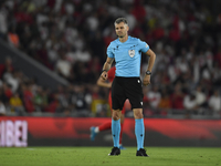 Referee Enea Jorgji in action  during the UEFA Nations League 2024/25 League B Group B4 match between Turkiye and Iceland at Gursel Aksel St...