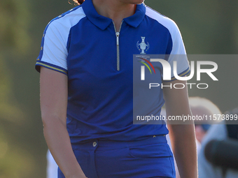 GAINESVILLE, VIRGINIA - SEPTEMBER 14: Georgia Hall of Team Europe walks on the third green during Day Two of the Solheim Cup at Robert Trent...