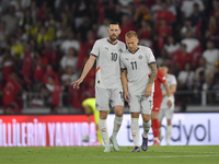 Gylfi Sigurdsson and Jon Dagur Thorsteinsson of Iceland   during the UEFA Nations League 2024/25 League B Group B4 match between Turkiye and...