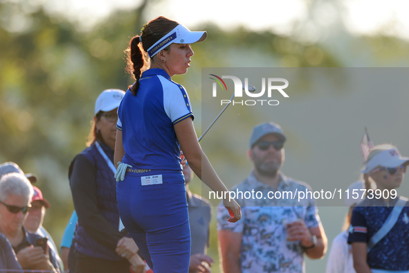 GAINESVILLE, VIRGINIA - SEPTEMBER 14: Georgia Hall of Team Europe walks on the third green during Day Two of the Solheim Cup at Robert Trent...