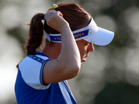 GAINESVILLE, VIRGINIA - SEPTEMBER 14: Georgia Hall of Team Europe walks on the third green during Day Two of the Solheim Cup at Robert Trent...